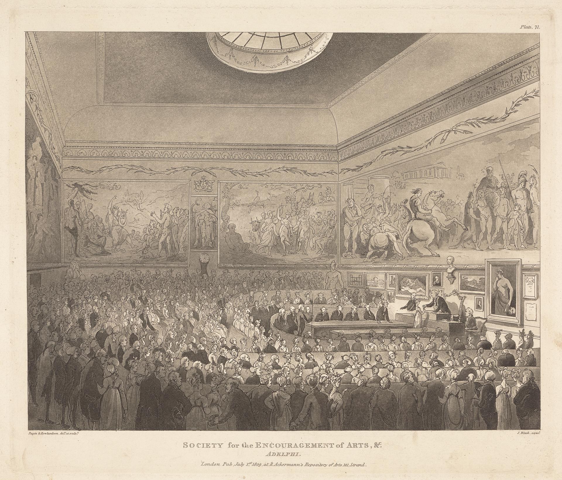 Gravur eines großen Raums mit stehenden und sitzenden Menschen, Fotorahmen an den Wänden und einer Decke, mit Text unten lesend "Gesellschaft zur Förderung der Künste".