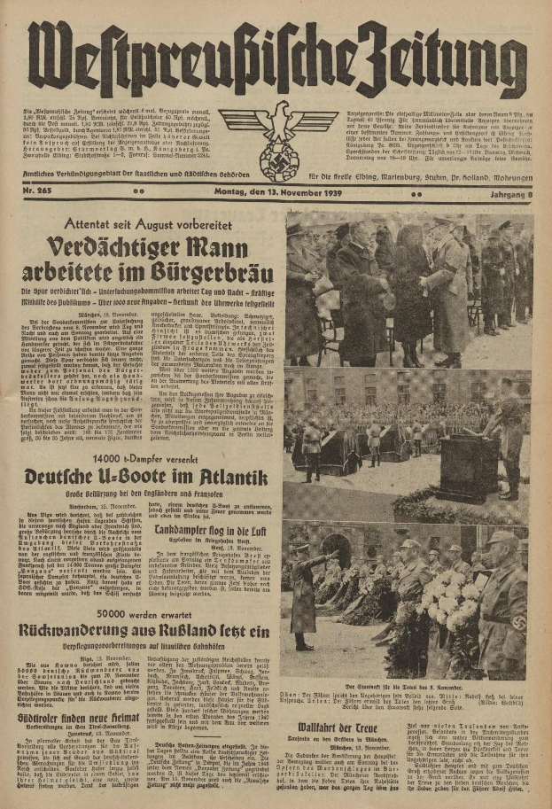 Schwarze Titelseite einer deutschen Zeitung vom 13. November 1939 mit der Überschrift "Weitpreubliche Zeitung", die eine Gruppe von Menschen in traditioneller deutscher Kleidung zeigt.