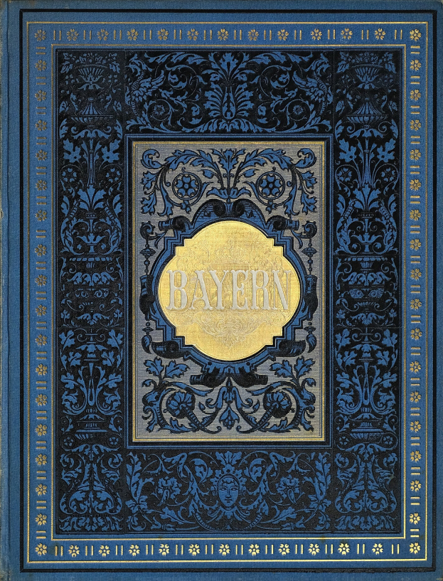 Ein blau-goldenes Buch mit der Aufschrift "Bayern", das mit detailreichen Designs verziert ist.