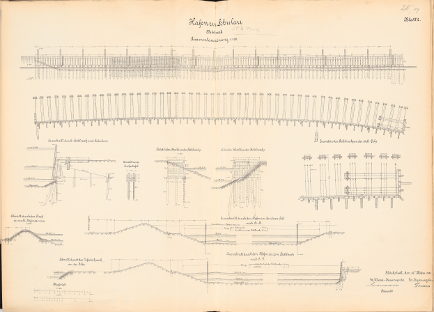 Offenes Buch mit detaillierten Zeichnungen und Text eines Schienensystems, einschließlich einer Illustration einer Eisenbahnschiene.
