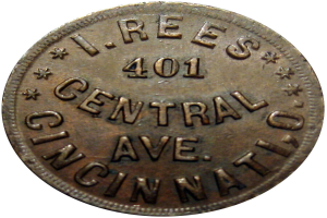 Eine Kupfermünze mit der Aufschrift "I.R.E.S. 401 Central Ave. Cincinnati" vor einem weißen Hintergrund.